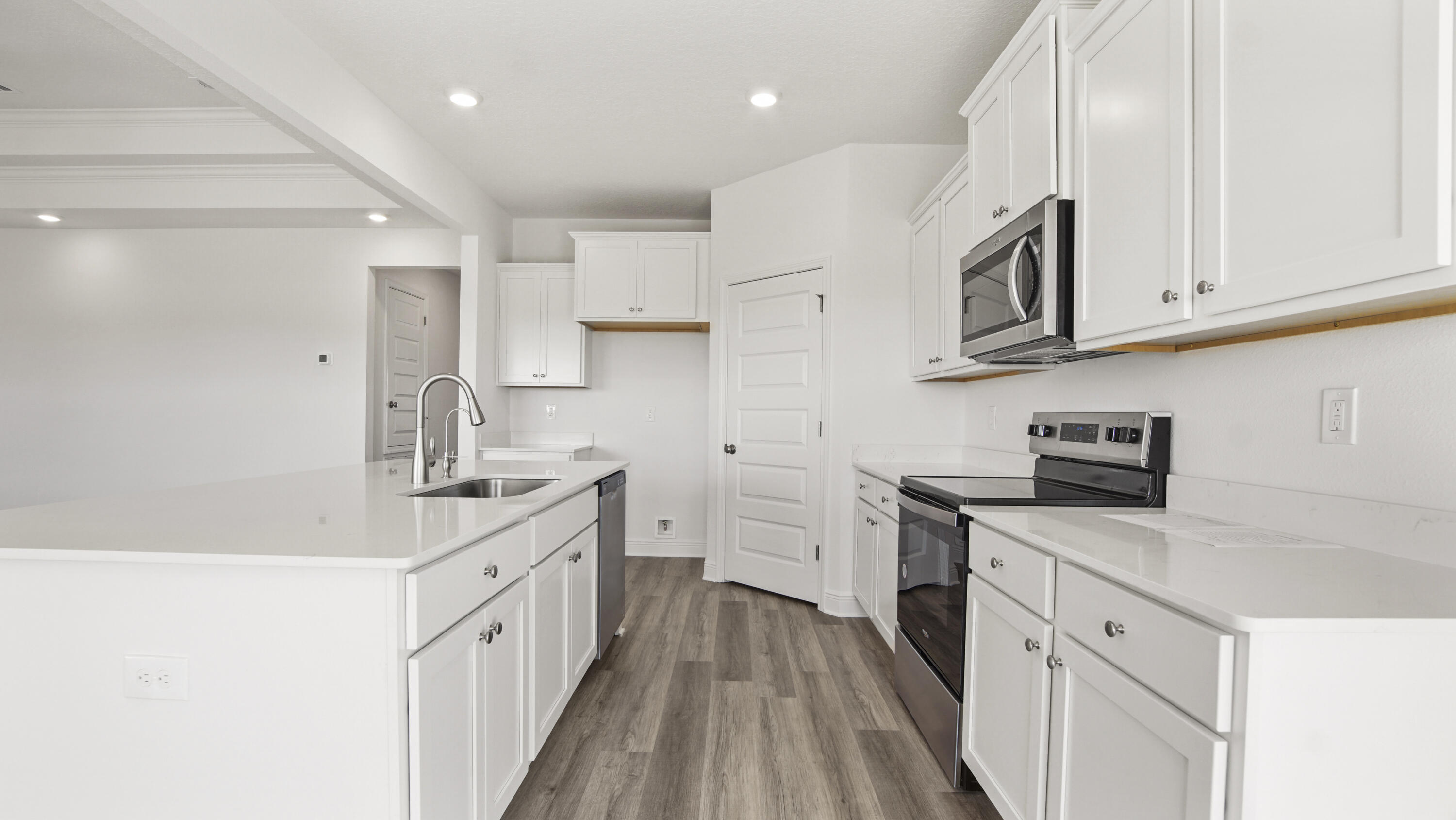 13 West W Farm Freeport, FL 32439 - Photo 20 of 38 a kitchen with stainless steel appliances granite countertop a sink stove and refrigerator