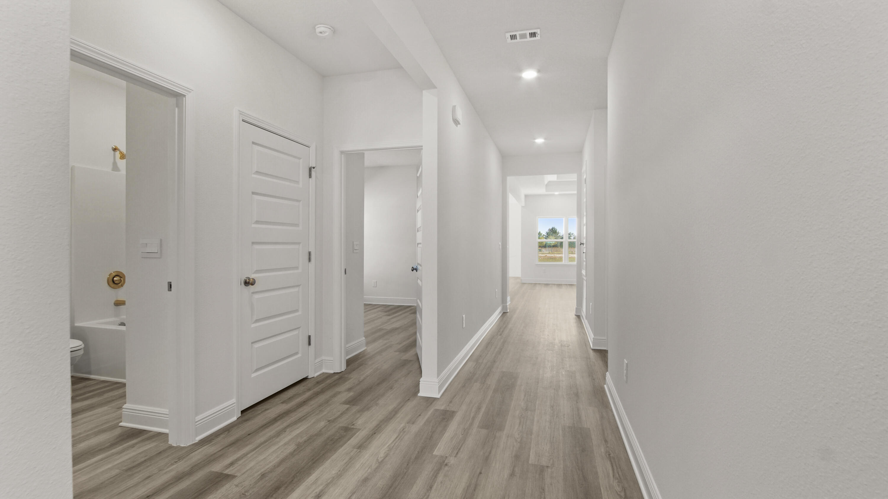 13 West W Farm Freeport, FL 32439 - Photo 3 of 38 wooden floor in an empty room