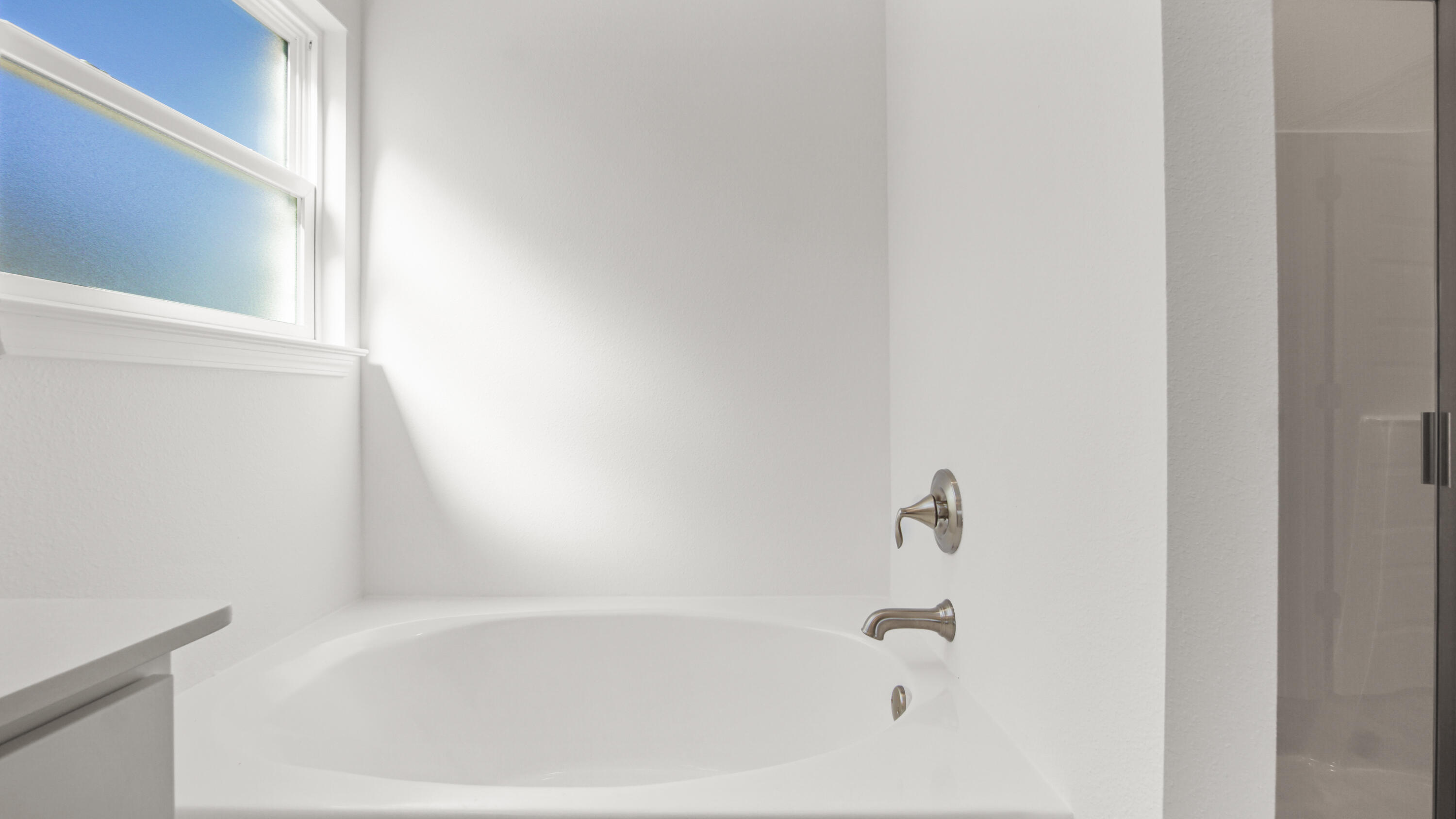 13 West W Farm Freeport, FL 32439 - Photo 31 of 38 a white bath tub sitting next to a white sink