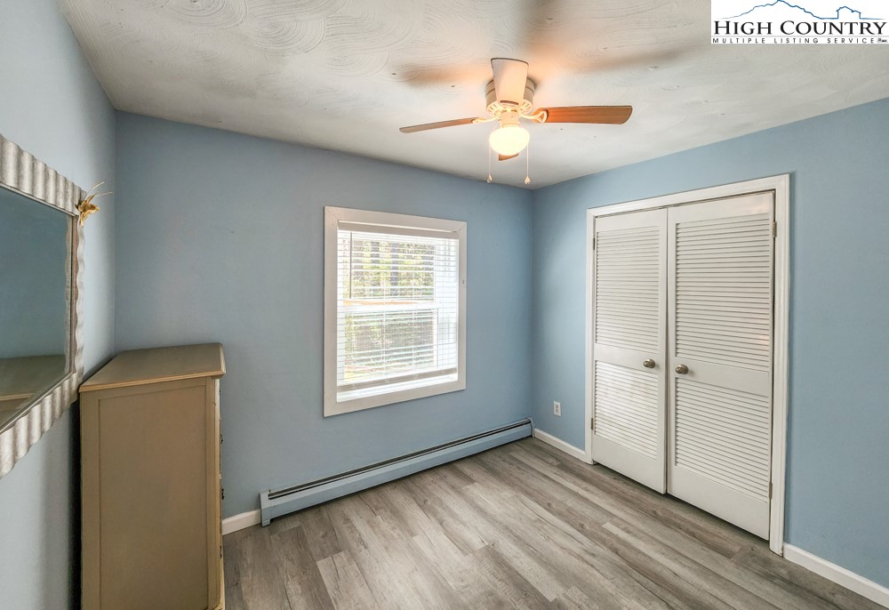130 Chandy Street Boone, NC 28607 - Photo 13 of 21 a view of empty room with wooden floor and fan