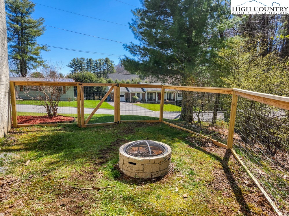 130 Chandy Street Boone, NC 28607 - Photo 18 of 21 a view of a swimming pool with a backyard