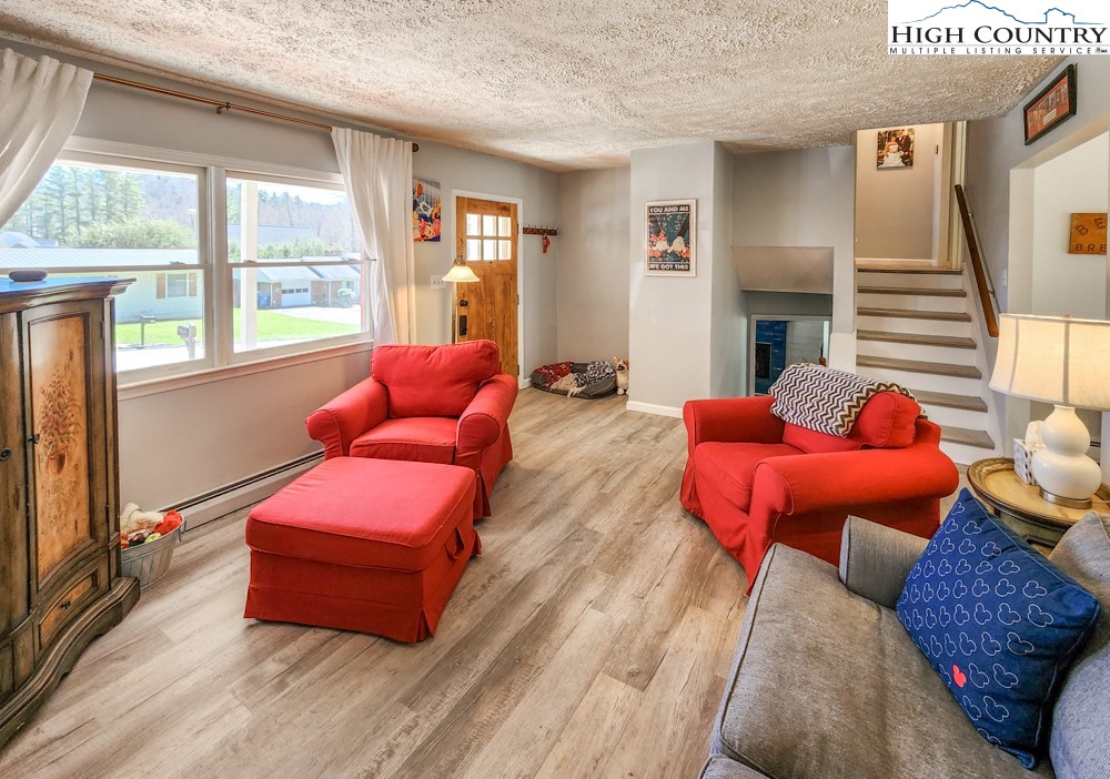 130 Chandy Street Boone, NC 28607 - Photo 4 of 21 a living room with furniture and a large window