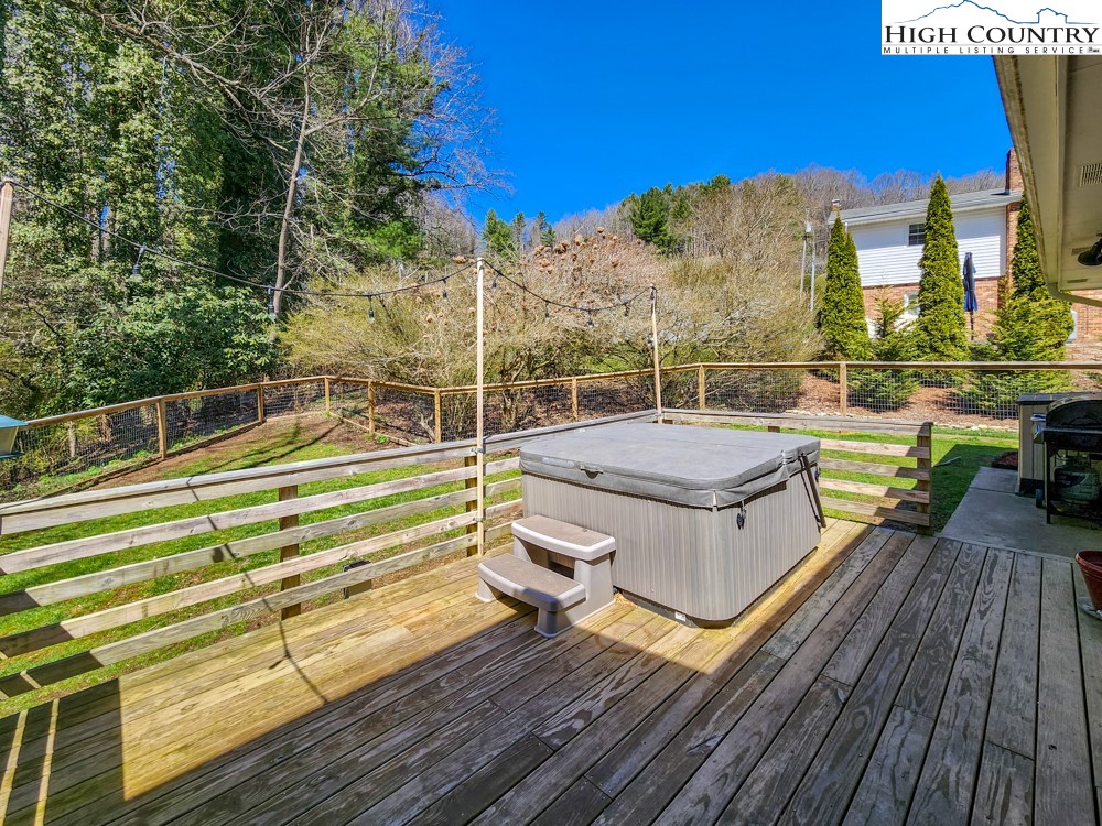 130 Chandy Street Boone, NC 28607 - Photo 7 of 21 a view of a roof deck with chair and wooden floor
