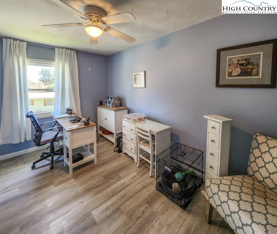 130 Chandy Street Boone, NC 28607 - Photo 10 of 21 a living room with furniture and a wooden floor
