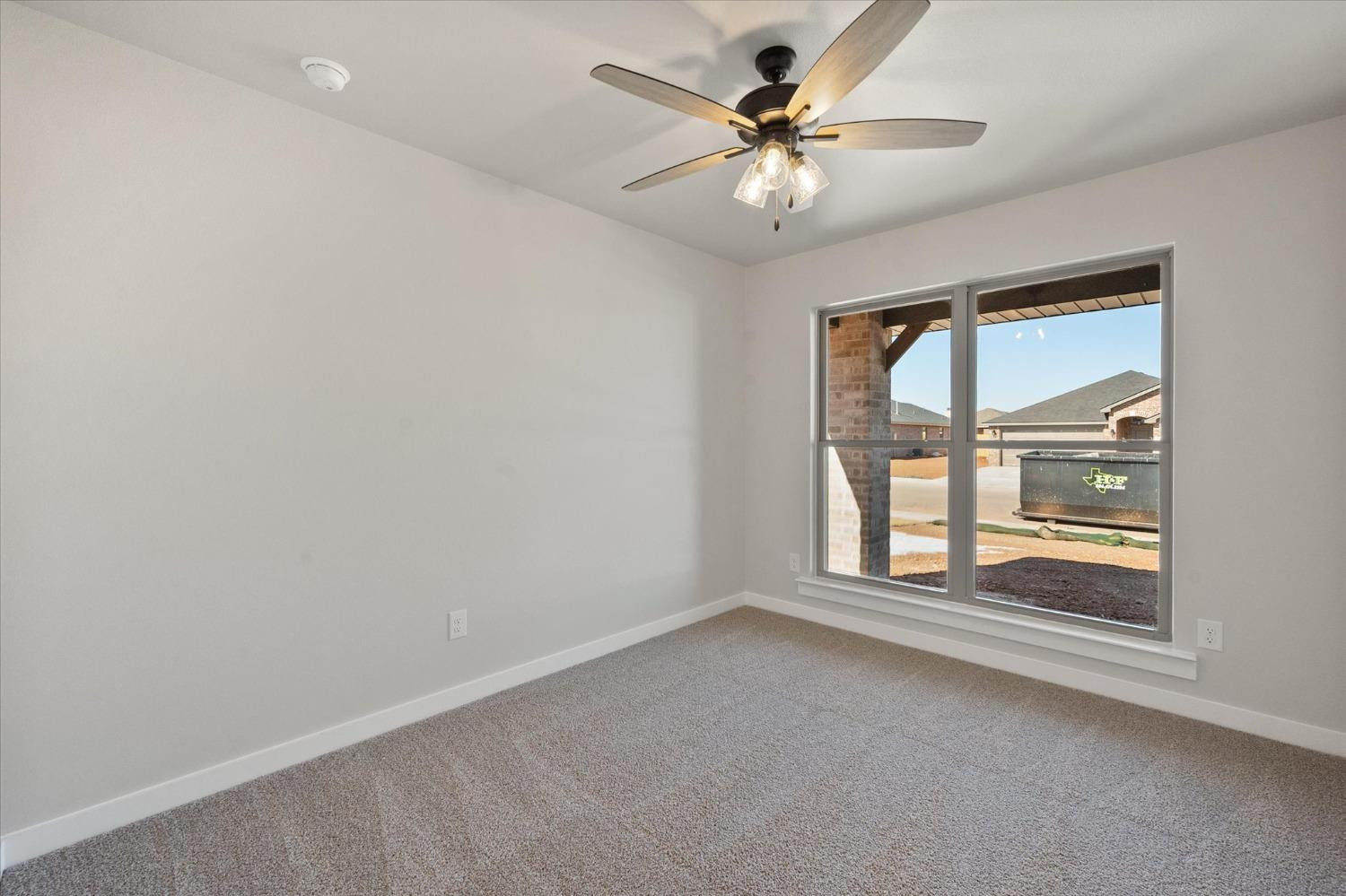 7429 30th Street Lubbock, TX 79407 - Photo 15 of 20 an empty room with a window