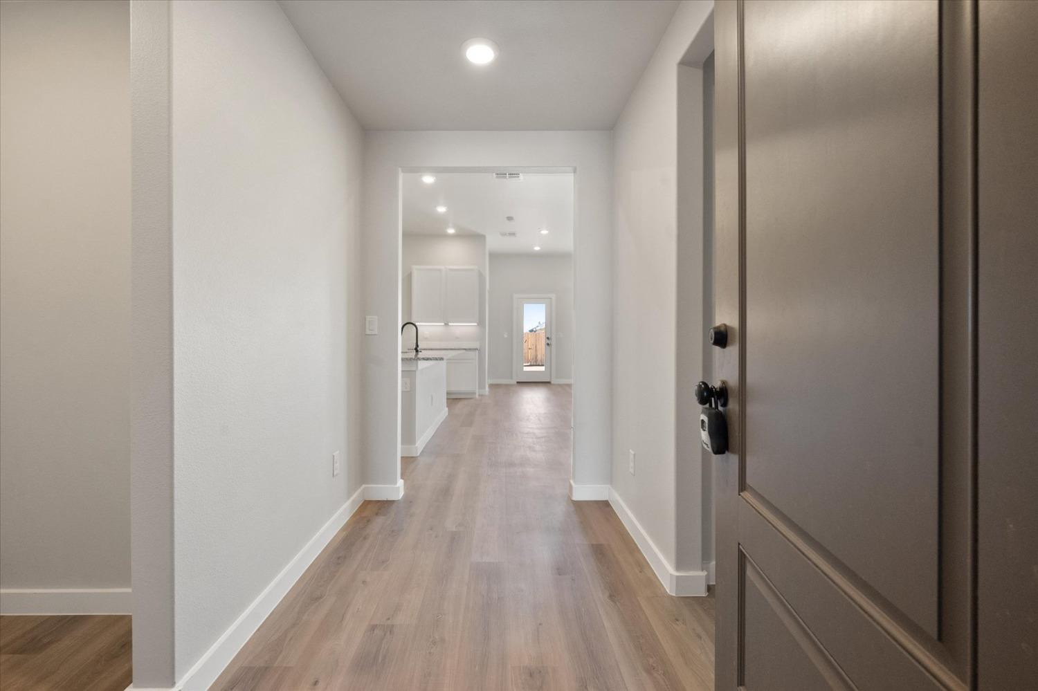 7429 30th Street Lubbock, TX 79407 - Photo 2 of 20 a view of a room with wooden floor