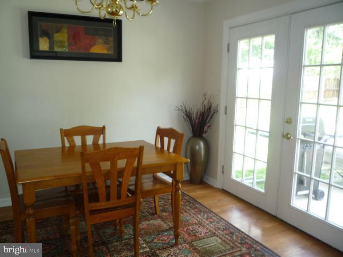 17221 Chiswell Road Poolesville, MD 20837 - Photo 10 of 23 a dining room with furniture and window