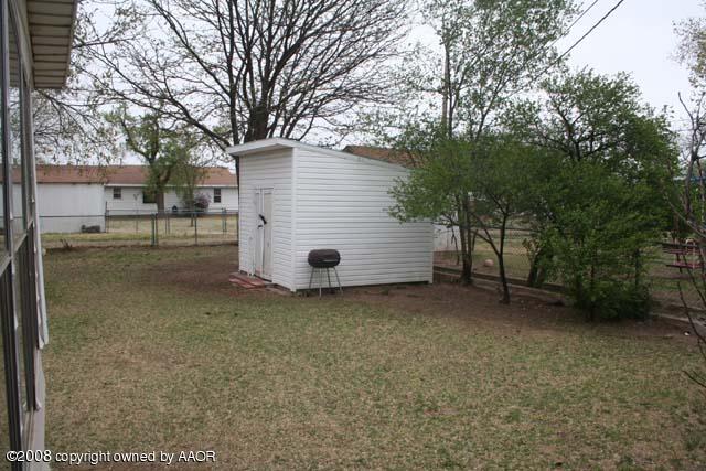 3625 South Travis Street Amarillo, TX 79110 - Photo 9 of 9 a view of a house with a backyard