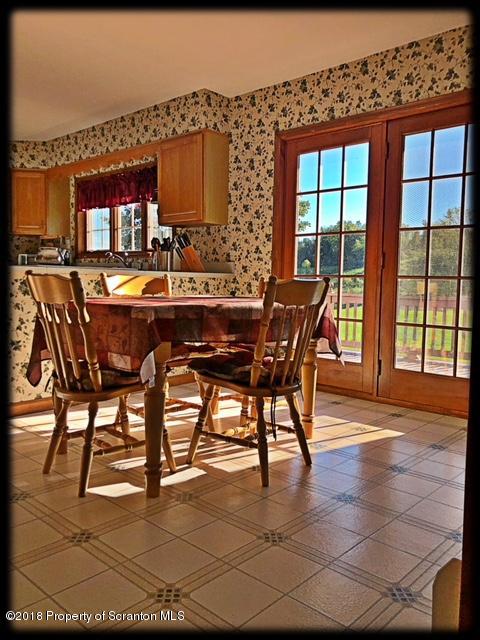 1345 Phillips Road Springville, PA 18844 - Photo 11 of 54 a dining room with furniture and window