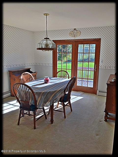 1345 Phillips Road Springville, PA 18844 - Photo 15 of 54 a table room with a table chairs and a bed