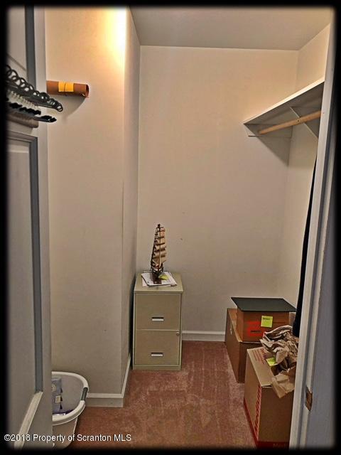 1345 Phillips Road Springville, PA 18844 - Photo 23 of 54 a view of a hallway with wooden floor and a fireplace