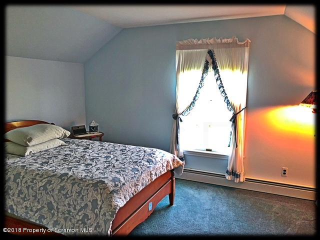 1345 Phillips Road Springville, PA 18844 - Photo 27 of 54 a bedroom with a bed and window