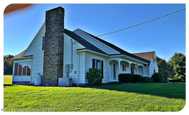 1345 Phillips Road Springville, PA 18844 - Photo 41 of 54 a front view of a house with a yard