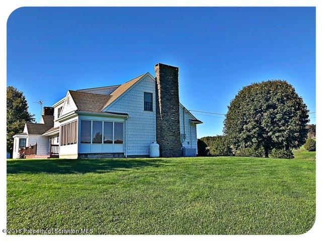 1345 Phillips Road Springville, PA 18844 - Photo 43 of 54 a view of a house with a yard