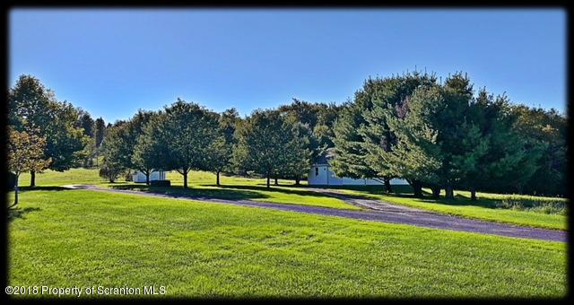 1345 Phillips Road Springville, PA 18844 - Photo 47 of 54 a view of a swimming pool with a yard