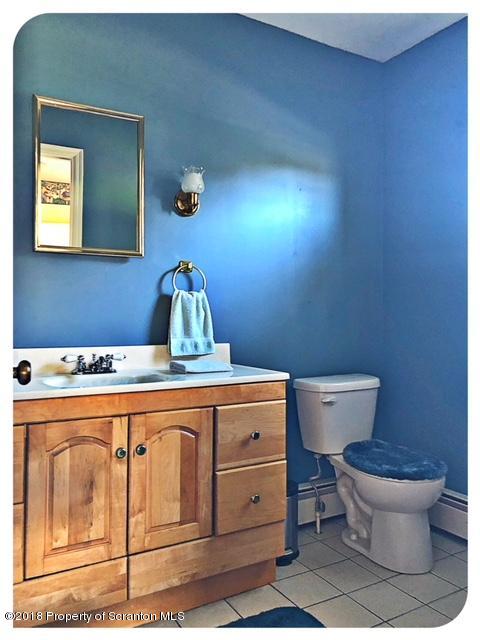 1345 Phillips Road Springville, PA 18844 - Photo 6 of 54 a bathroom with a toilet and a sink