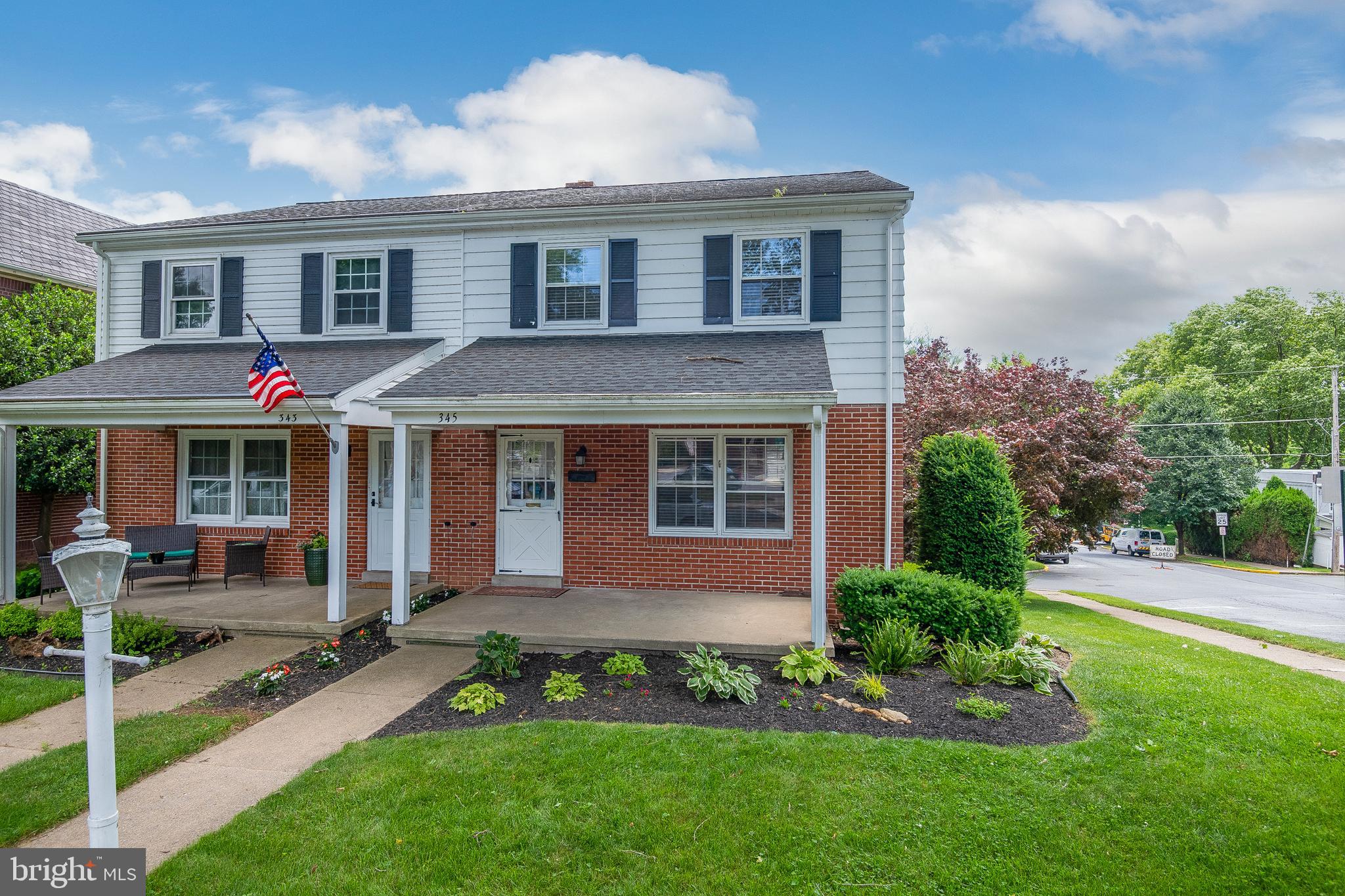 345 Sunset Road West Reading, PA 19611 - Photo 1 of 29 a front view of a house with a yard