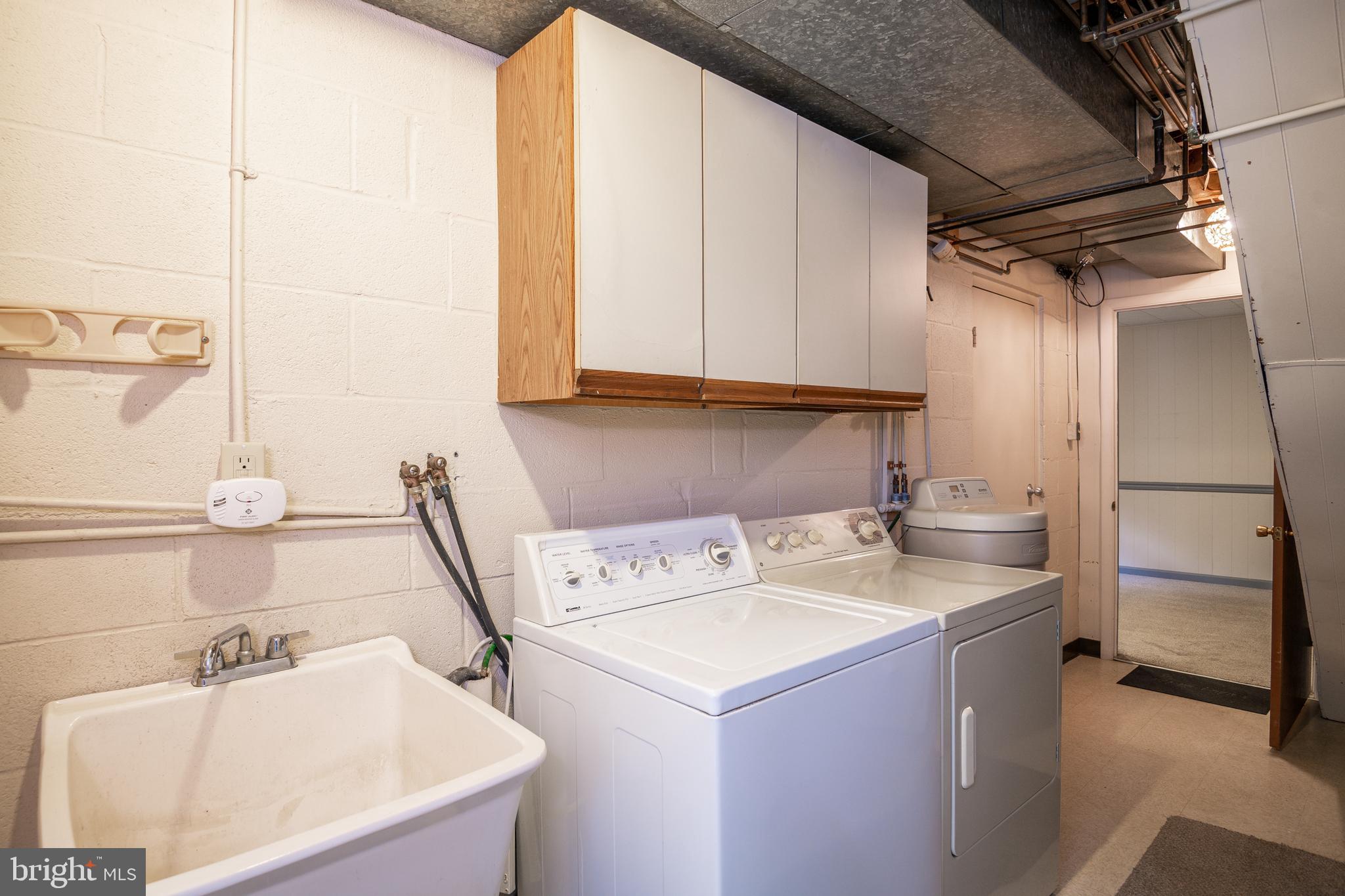 345 Sunset Road West Reading, PA 19611 - Photo 28 of 29 a utility room with a sink washer and dryer