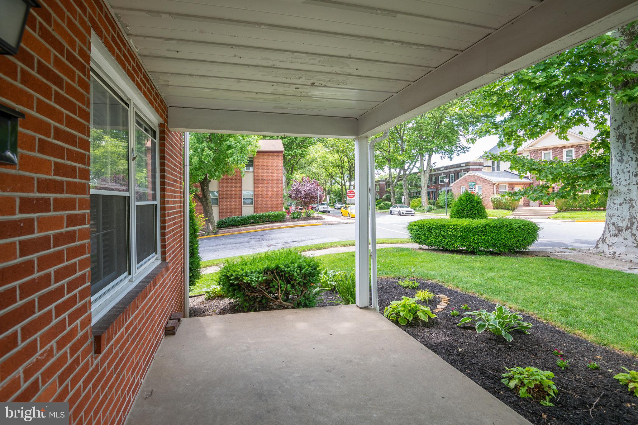 345 Sunset Road West Reading, PA 19611 - Photo 4 of 29 a view of a backyard with garden and plants