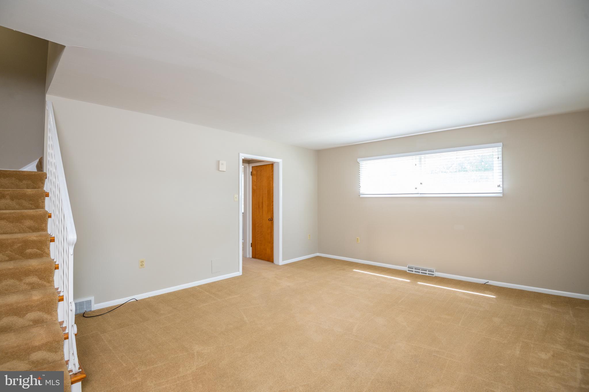 345 Sunset Road West Reading, PA 19611 - Photo 5 of 29 an empty room with windows