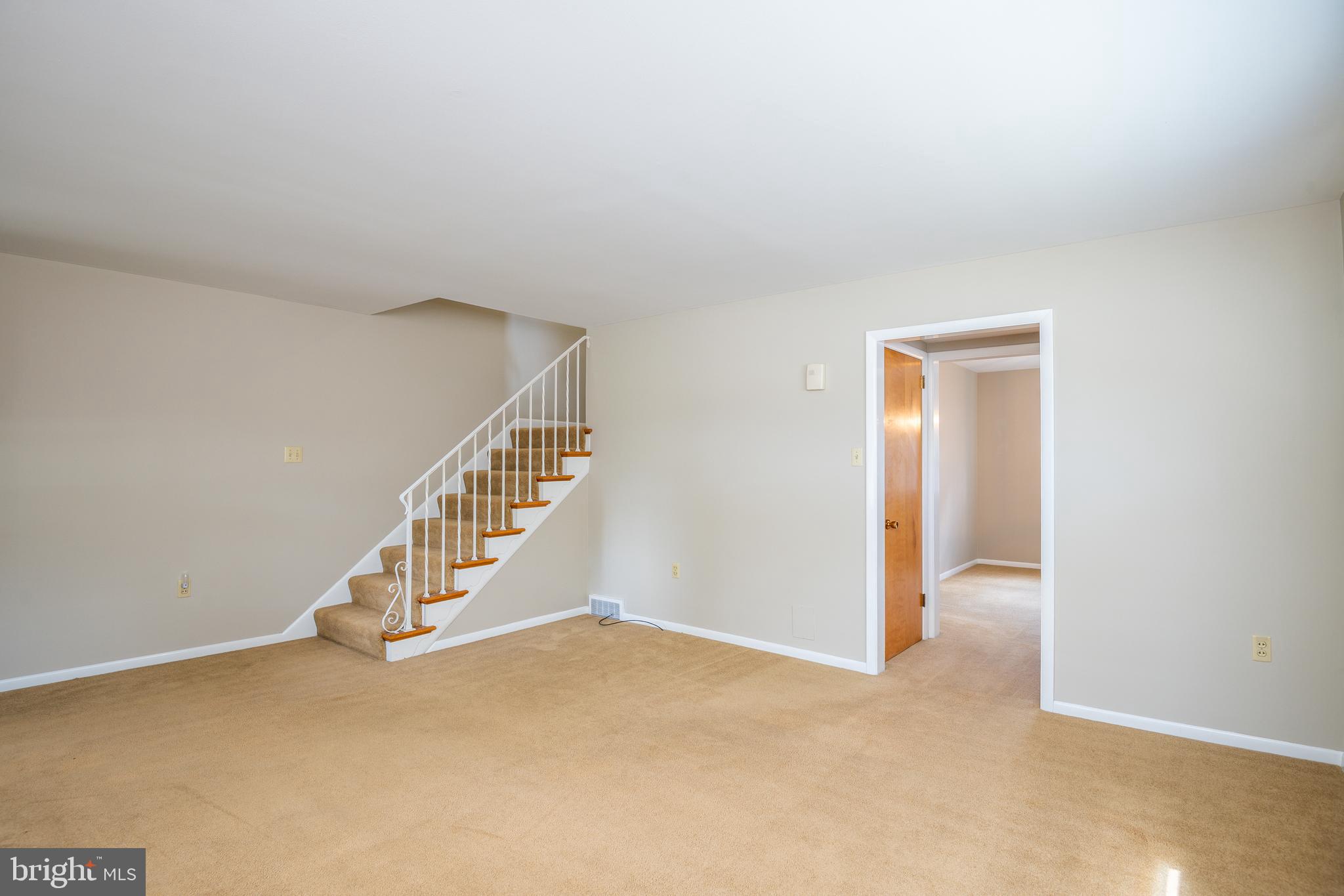 345 Sunset Road West Reading, PA 19611 - Photo 6 of 29 a view of an empty room with stairs
