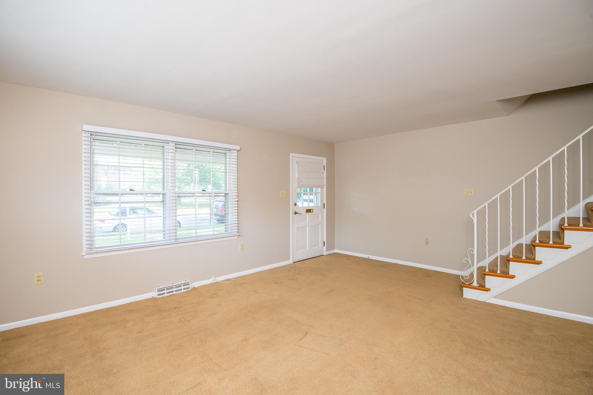 345 Sunset Road West Reading, PA 19611 - Photo 7 of 29 a view of an empty room with a window