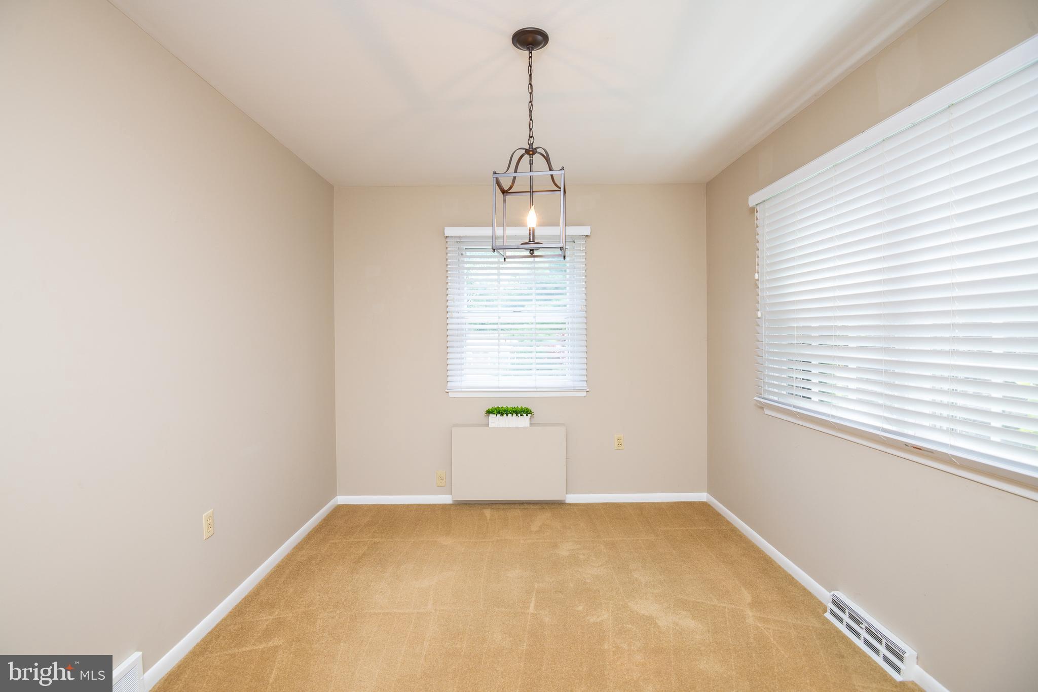 345 Sunset Road West Reading, PA 19611 - Photo 9 of 29 a view of an empty room with a window