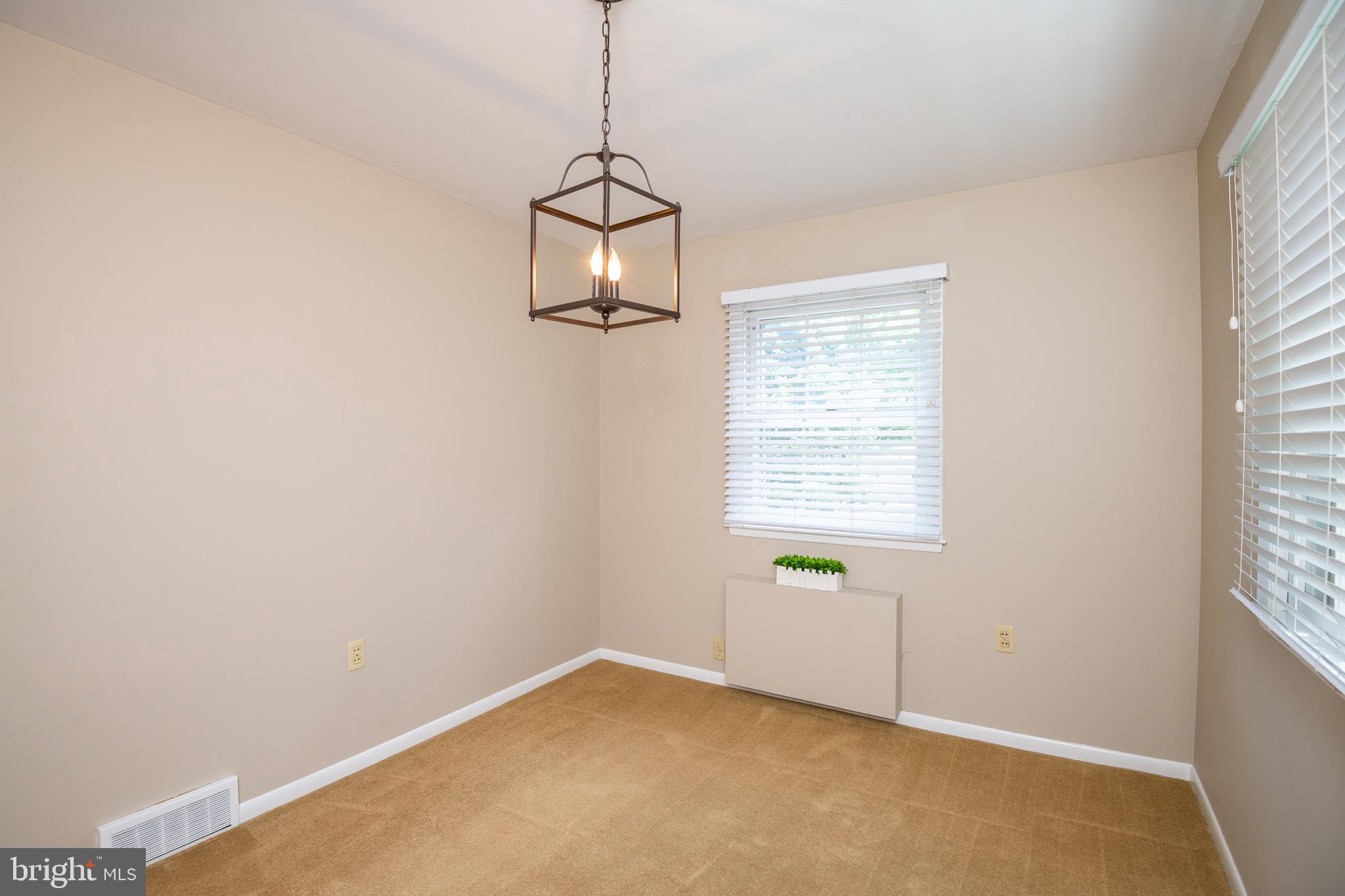 345 Sunset Road West Reading, PA 19611 - Photo 10 of 29 a view of an empty room with a window