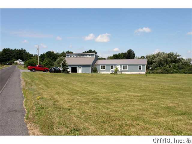 21831 Knowlesville Road Pamelia, NY 13601 - Photo 3 of 25 Exterior Front. Over 700 ft. of road frontage.