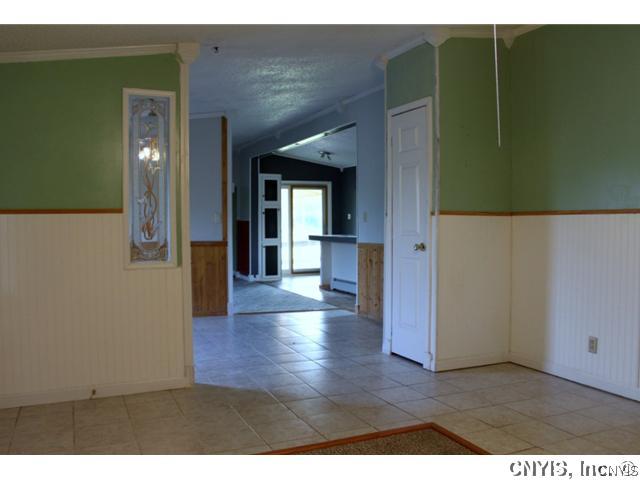21831 Knowlesville Road Pamelia, NY 13601 - Photo 5 of 25 Living Room. Upon entering this home the first thi
