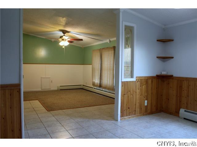 21831 Knowlesville Road Pamelia, NY 13601 - Photo 6 of 25 Living Room. Looking into living room from dining