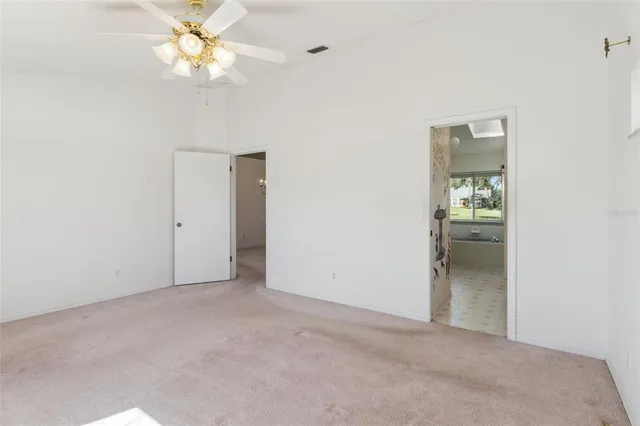 an aerial view of residential houses with outdoor space and street view