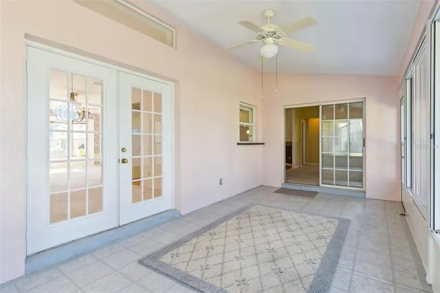 a view of a swimming pool with a yard