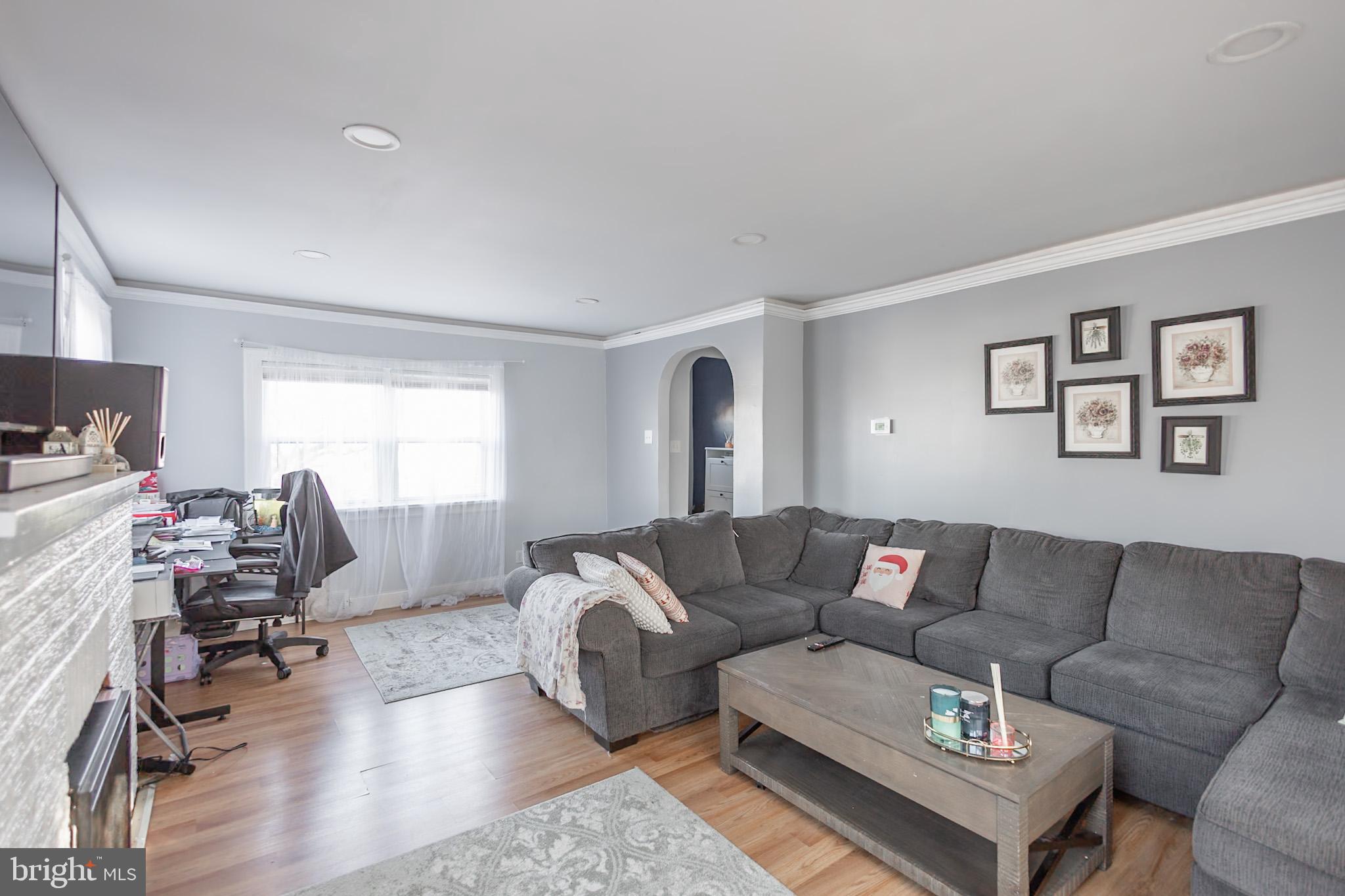 924 West Evesham Road Glendora, NJ 08029 - Photo 11 of 28 a living room with furniture and a wooden floor