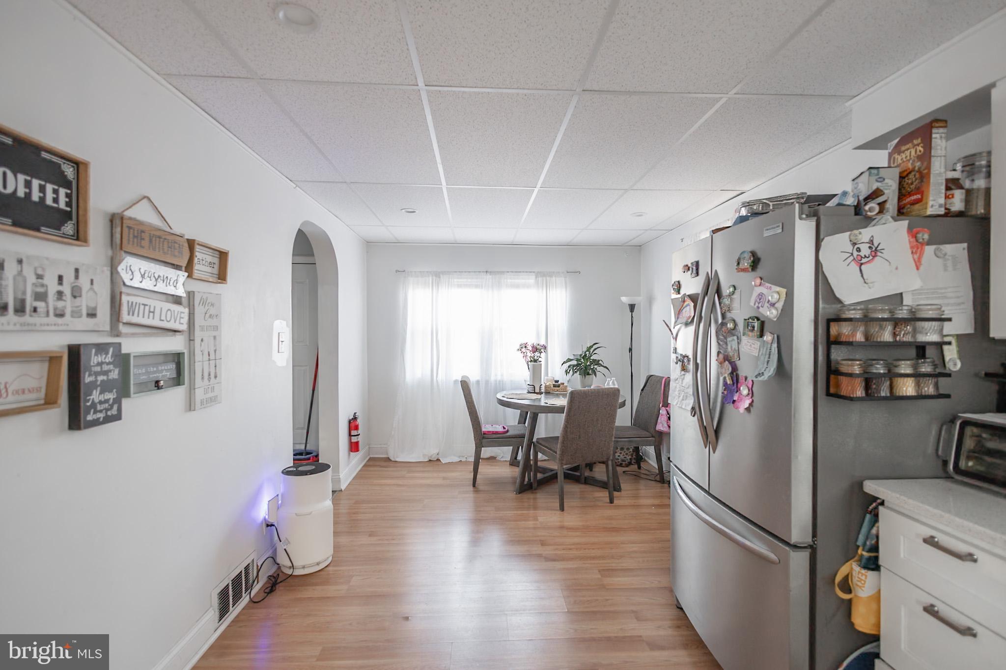 924 West Evesham Road Glendora, NJ 08029 - Photo 15 of 28 a view of a dining room with furniture window and wooden floor