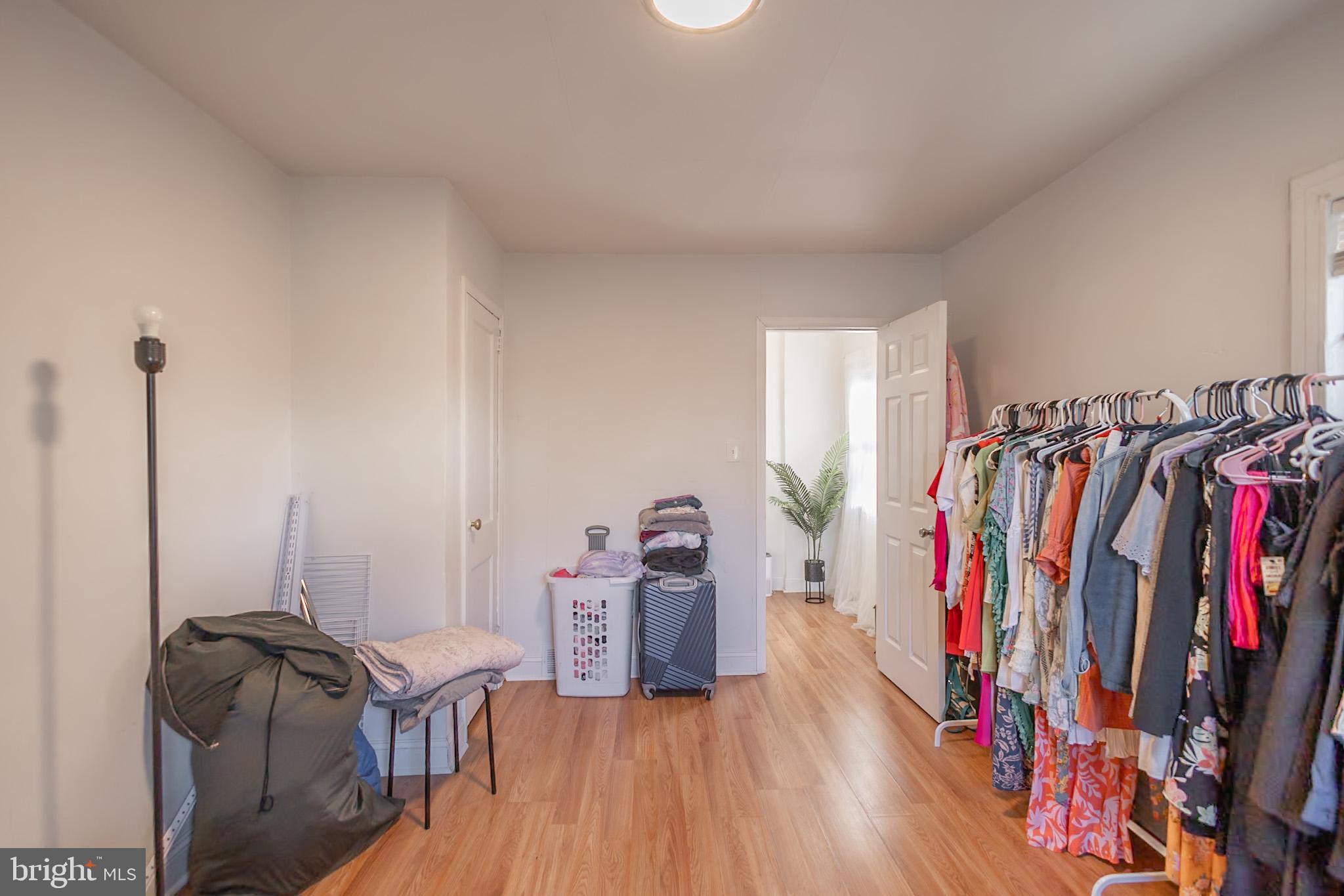 924 West Evesham Road Glendora, NJ 08029 - Photo 20 of 28 a view of a room with furniture and clothes