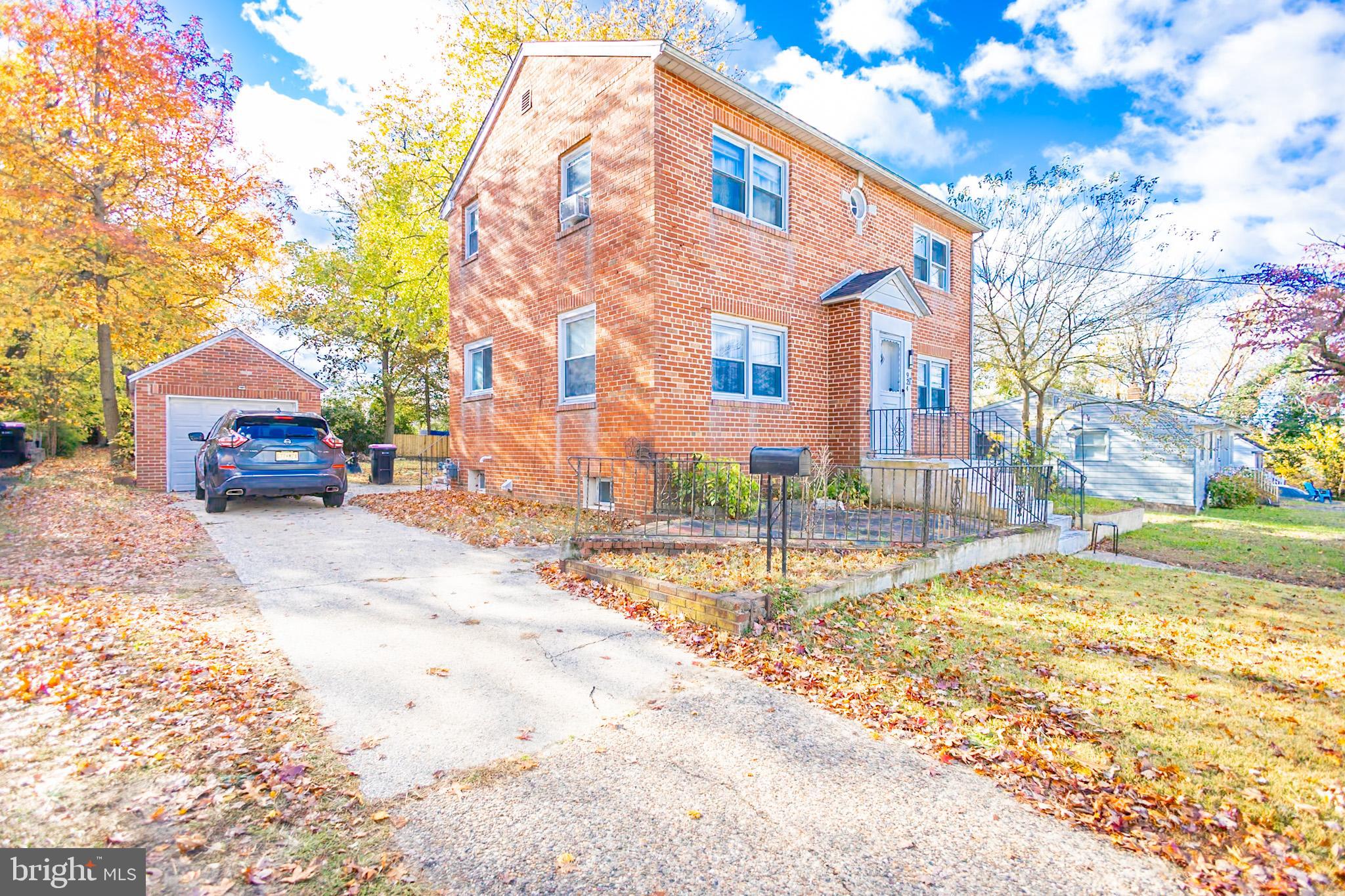 924 West Evesham Road Glendora, NJ 08029 - Photo 3 of 28 a street view with a building
