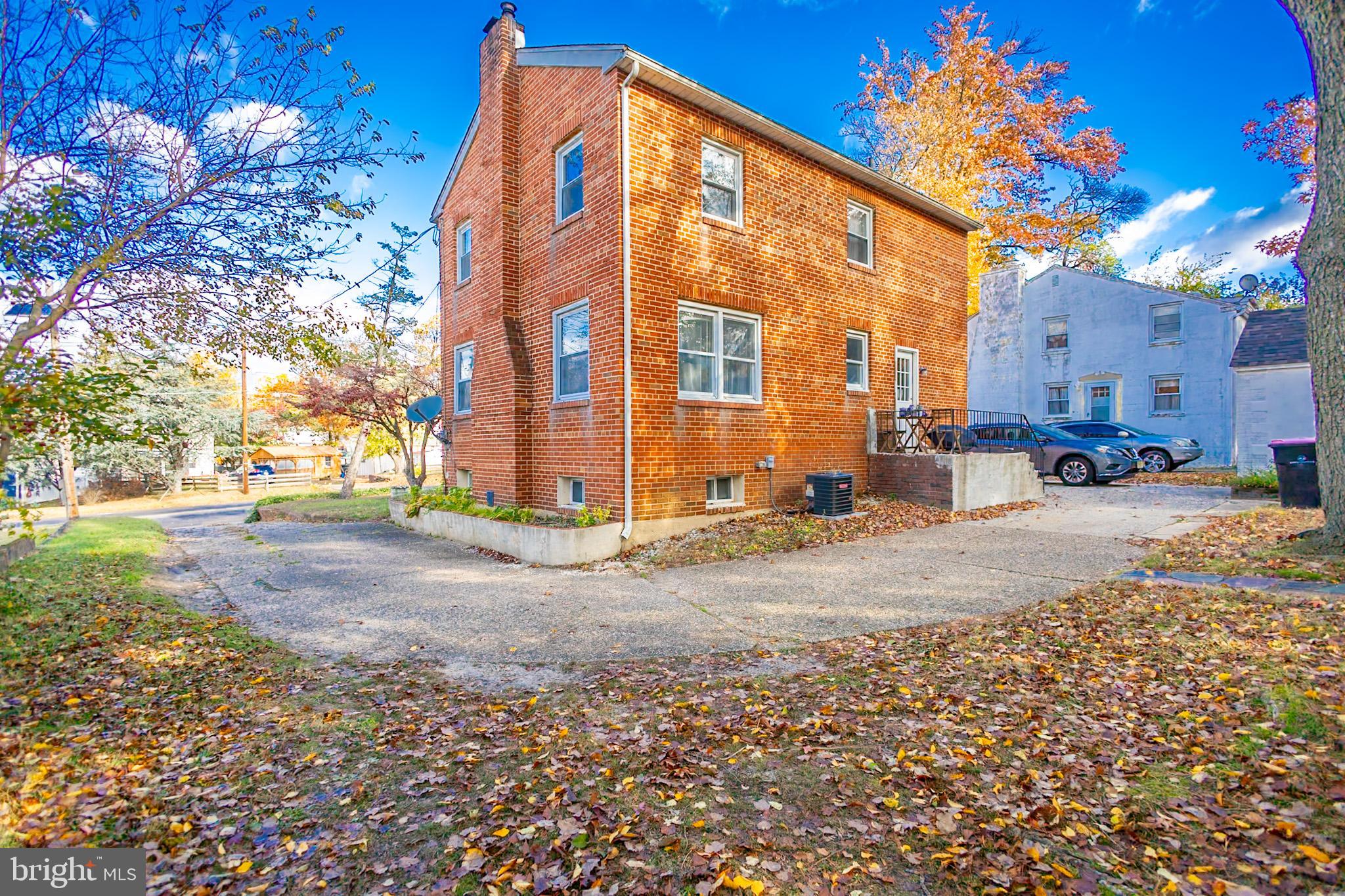 924 West Evesham Road Glendora, NJ 08029 - Photo 4 of 28 a view of a street with a building