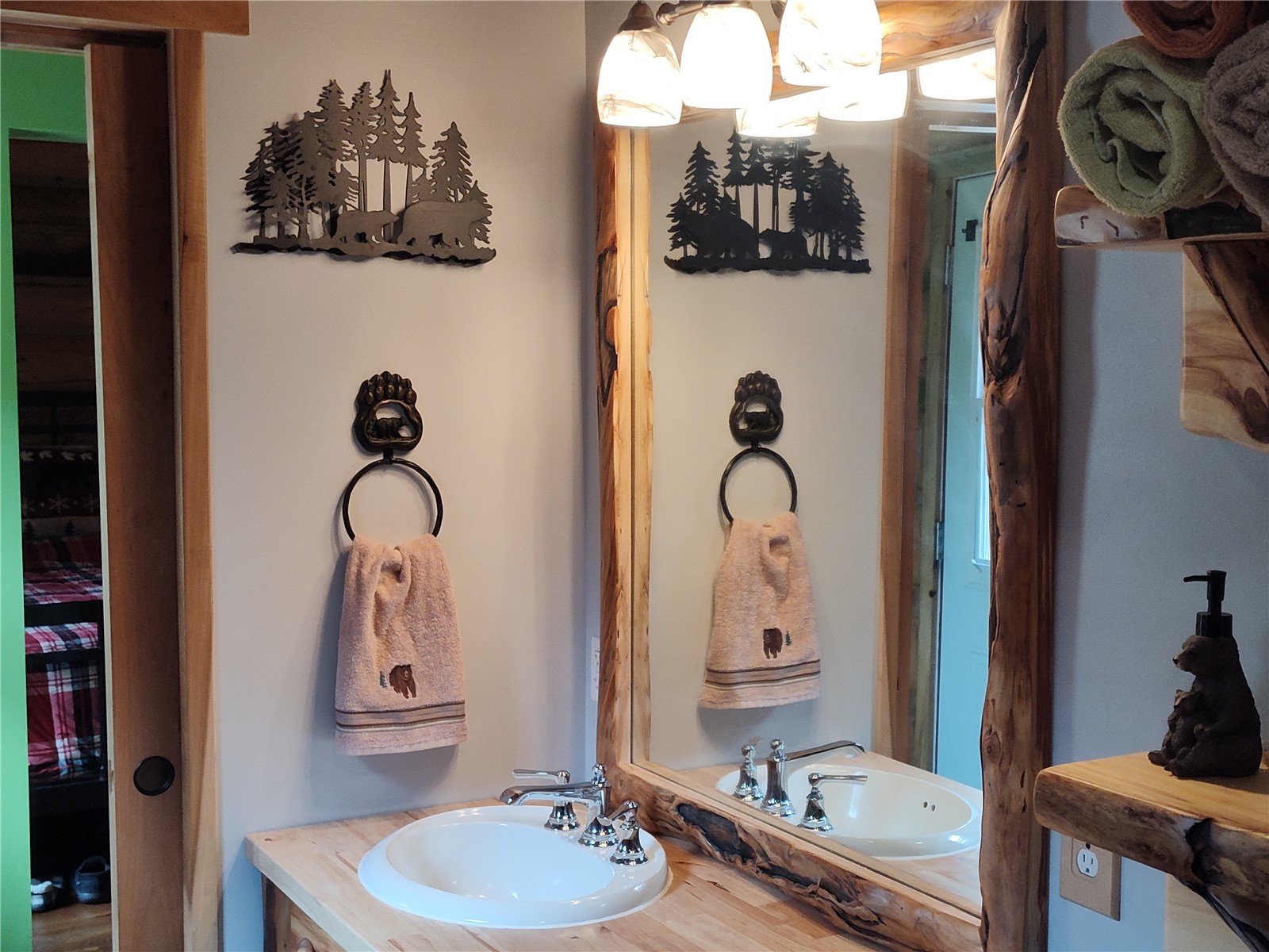 5 Arland Road Como, CO 80456 - Photo 21 of 33 a bathroom with a sink mirror and vanity