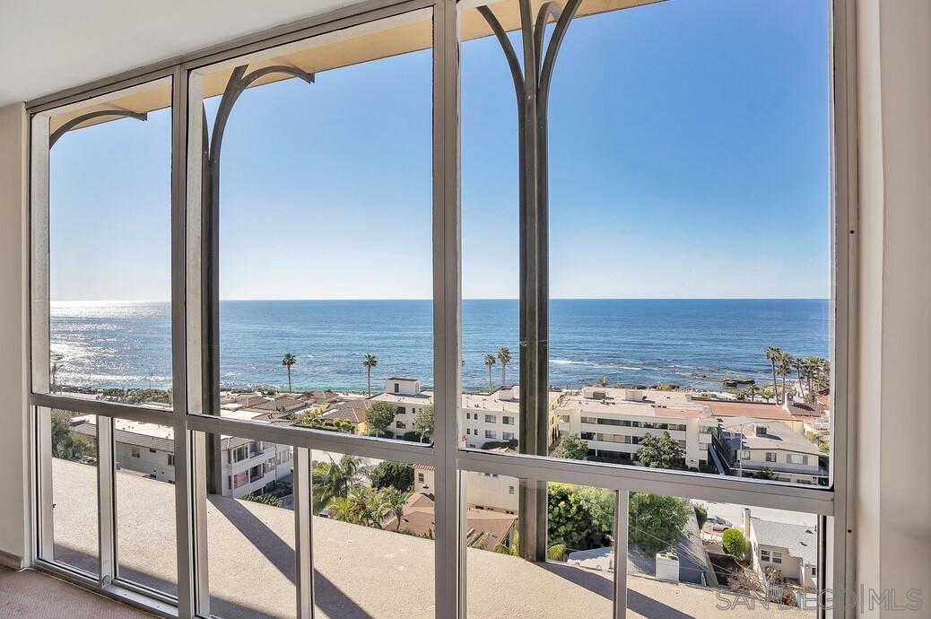 a view of a balcony with an ocean view