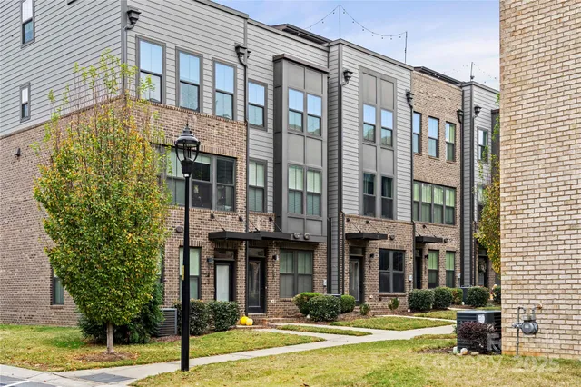 a front view of a building with street view