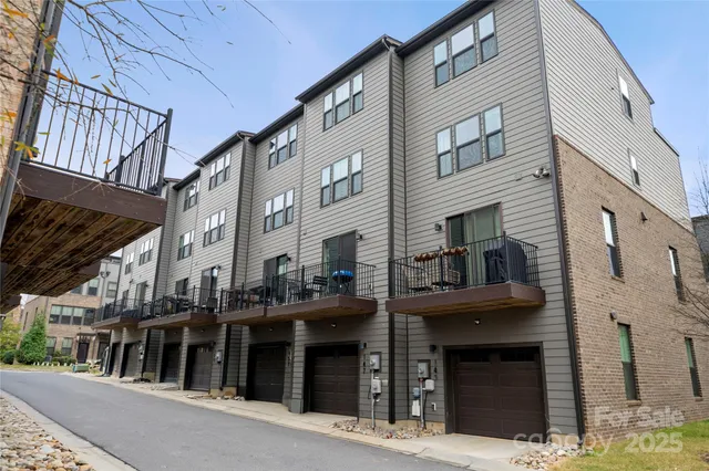 a view of a building with a street