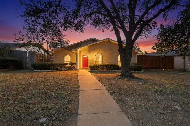 a house with trees in front of it