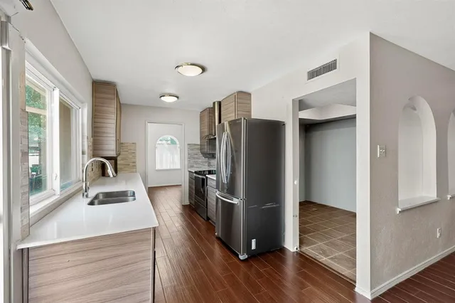 an empty room with windows