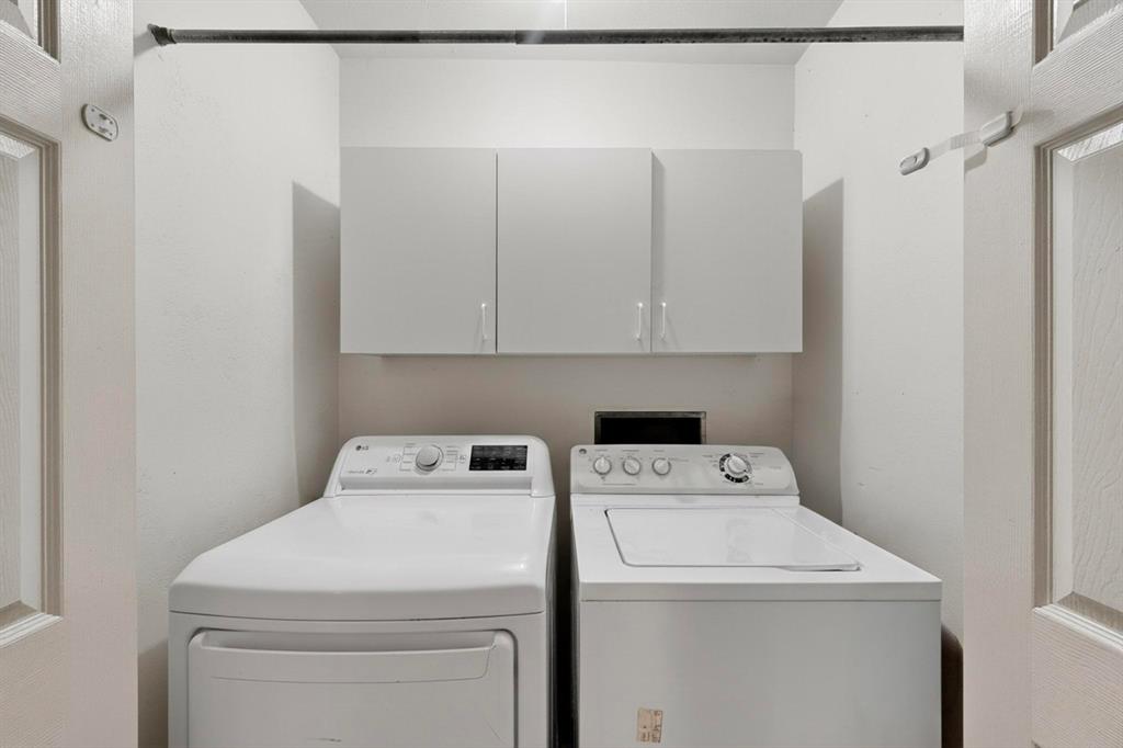 913 Overdowns Drive Plano, TX 75023 - Photo 29 of 35 a utility room with dryer and washer