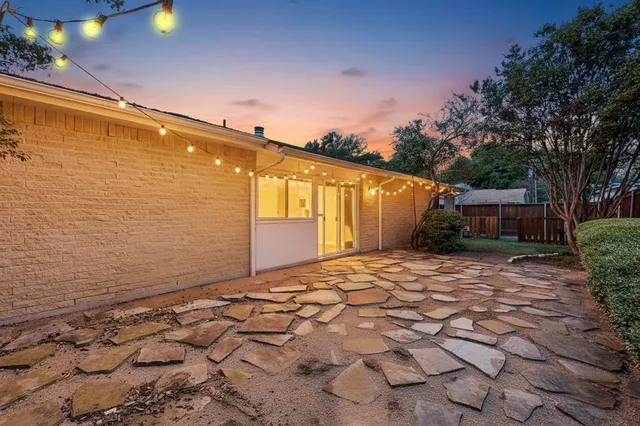 a outdoor living space with furniture and a potted plant