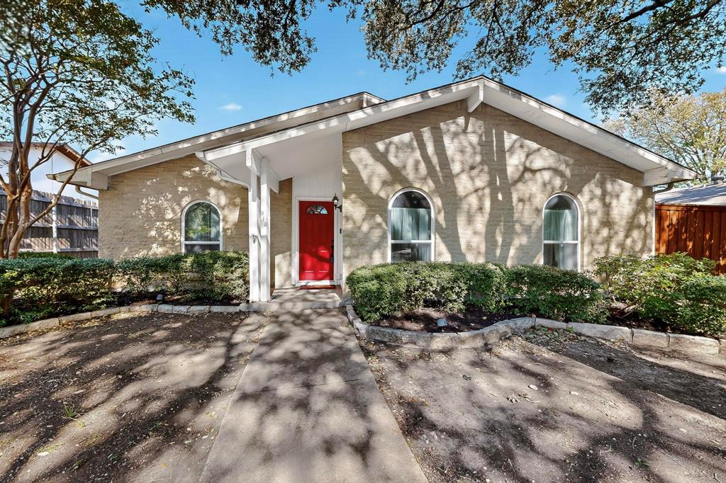 913 Overdowns Drive Plano, TX 75023 - Photo 3 of 35 a front view of a house with garden