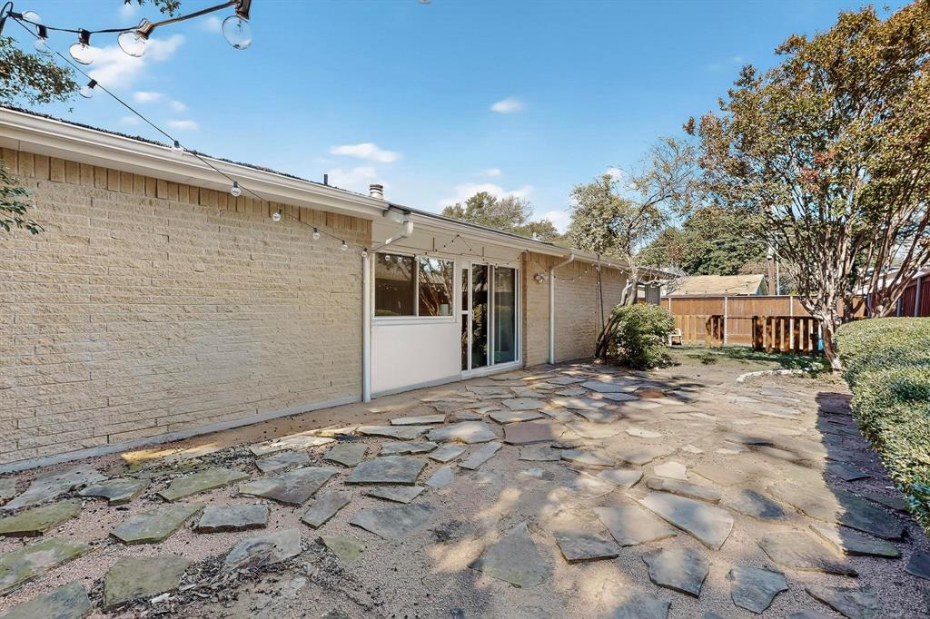 913 Overdowns Drive Plano, TX 75023 - Photo 32 of 35 a view of a house with a snow in the background