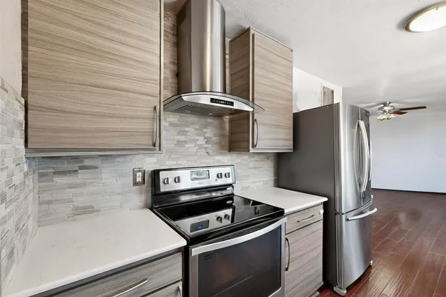 a kitchen with a sink and a window