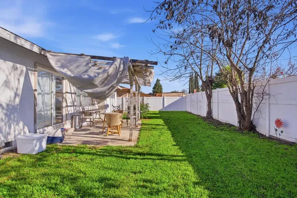 a view of a backyard with a garden